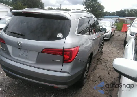 2017 Honda Pilot Touring z USA, uszkodzony, nr VIN 5FNYF5H96HB043319